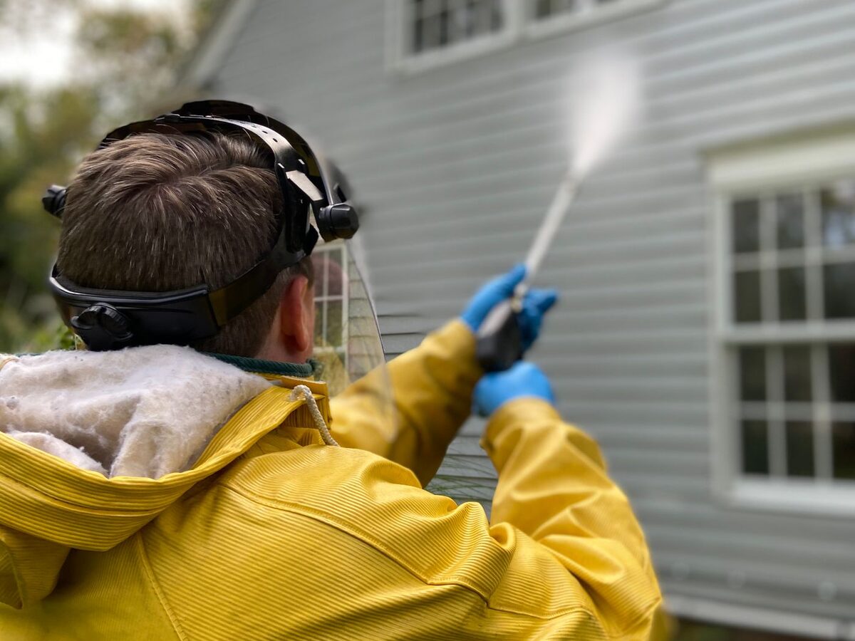 Soft washing white clapboard house siding - house washing Fairfield County CT